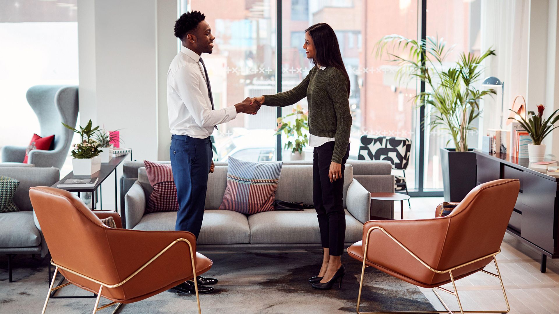 Man and woman shaking hands
